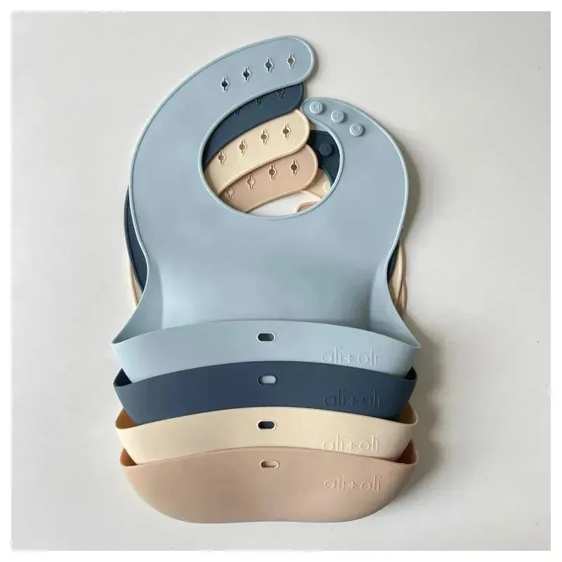 Ali   Oli - Silicone Baby Bib Roll Up & Stay Closed, Sky